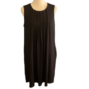 Calvin Klein Black Mini Dress. Lined with pockets. Size 12P. Zipper back.